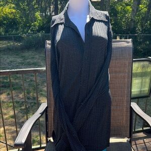Black and White Striped Button-Up Shirt. Size L.
PW 5